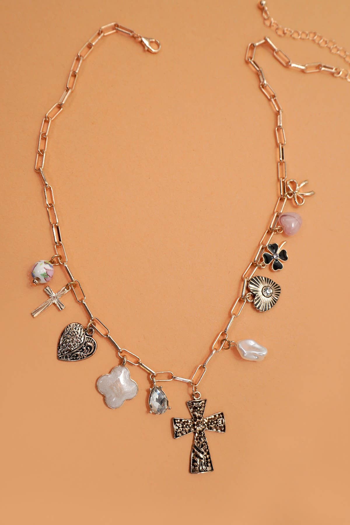 Charm Necklace – Clover, Cross, Heart, and Bow { product_type }}