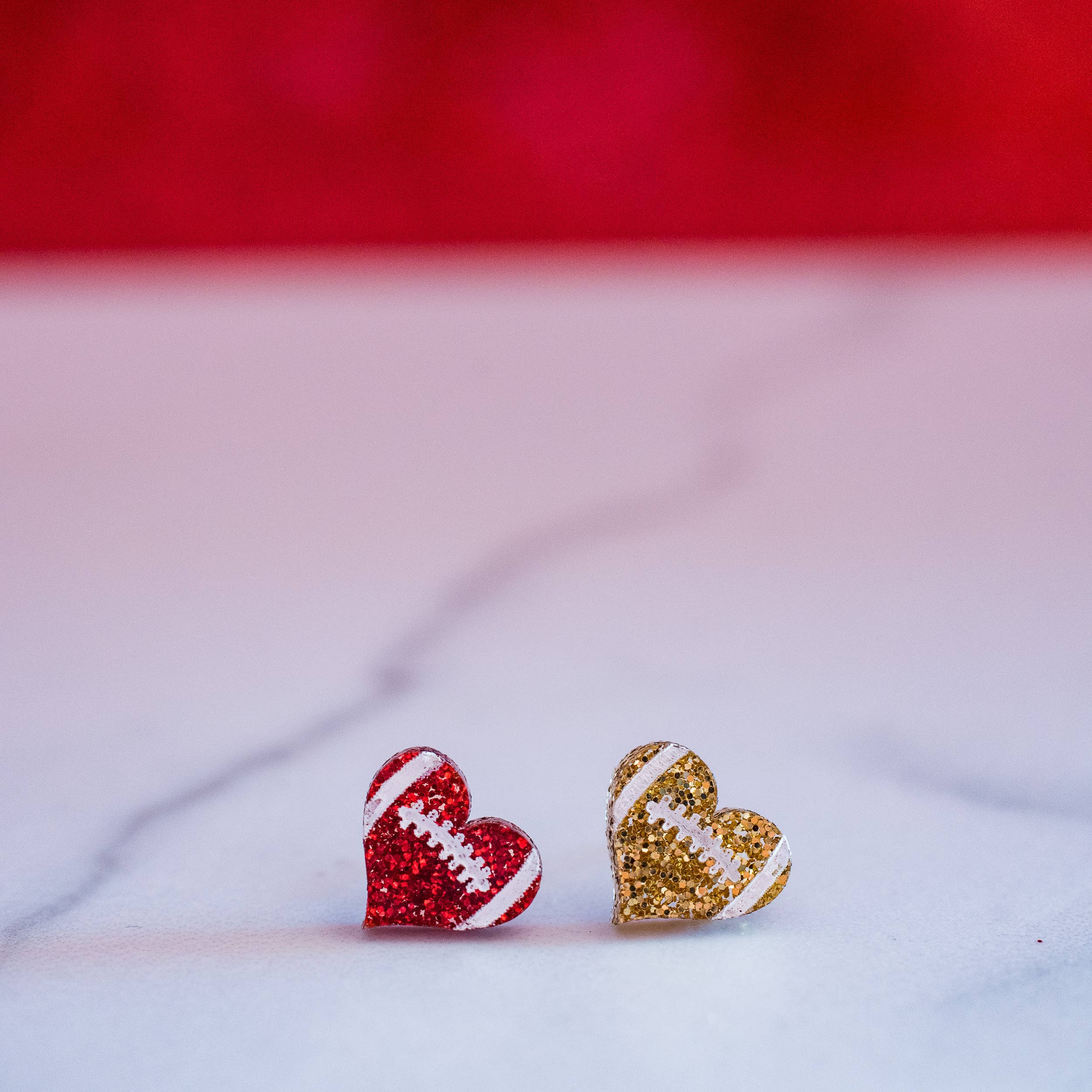 Kansas City Football Glitter Football Heart Studs { product_type }}