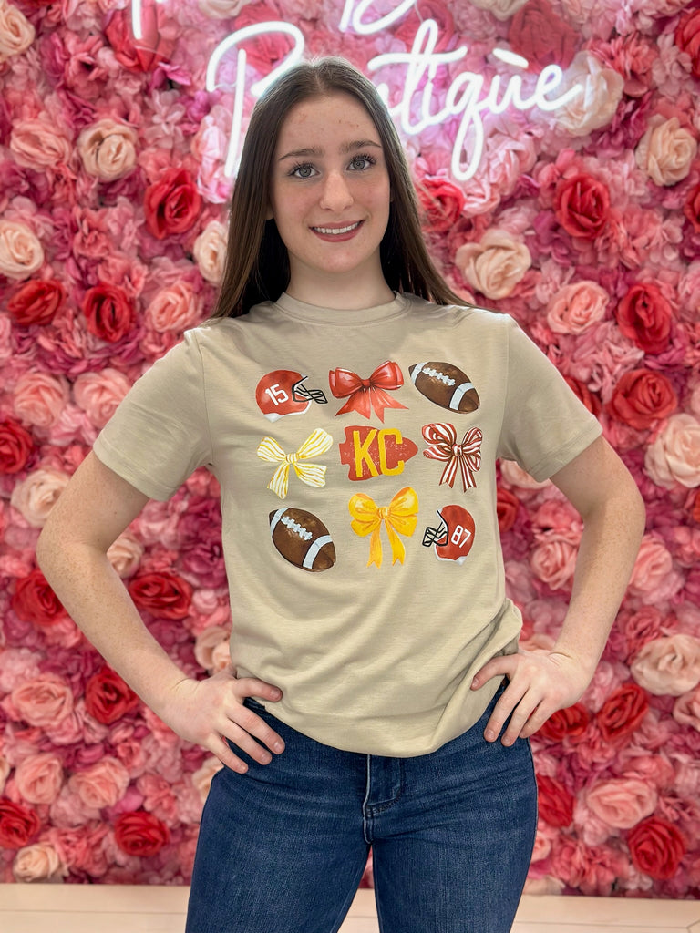 KC Football and Bows Graphic Tee-Graphic Tees-Tres Birdos Graphic Tees-Three Birdies Boutique, Women's Fashion Boutique Located in Kearney, MO