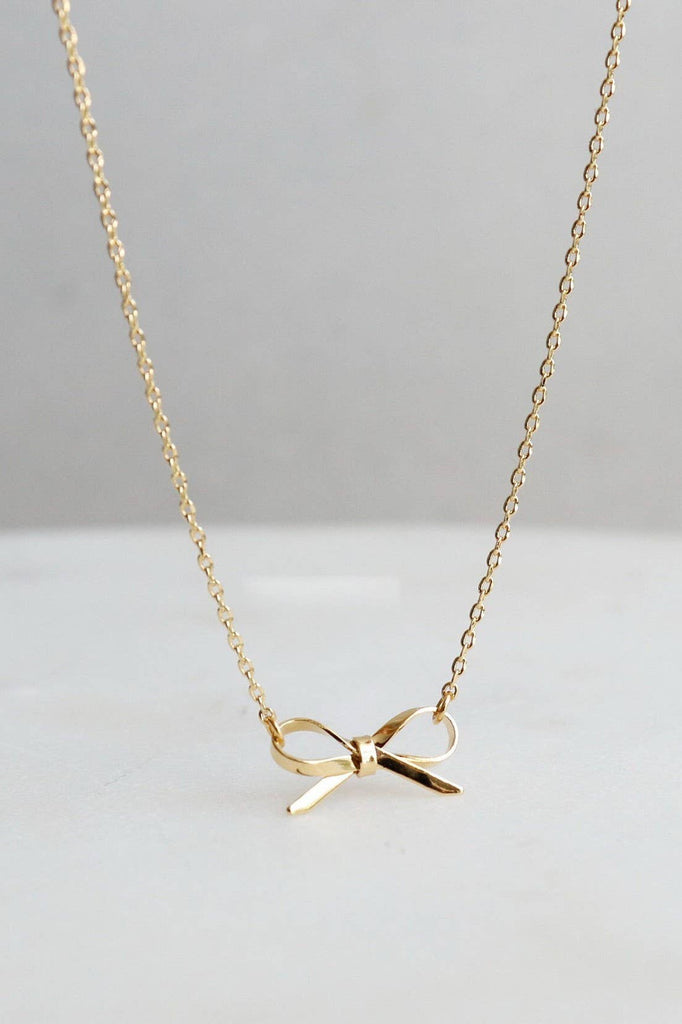 Gold Bow Necklace-JOSSLYN by wall to wall-Three Birdies Boutique, Women's Fashion Boutique Located in Kearney, MO