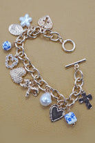 Heart, Cross, Bow Bracelet { product_type }}