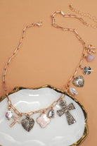 Charm Necklace – Clover, Cross, Heart, and Bow { product_type }}