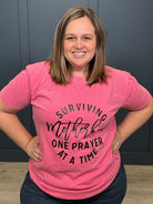 Surviving Motherhood Tee { product_type }}