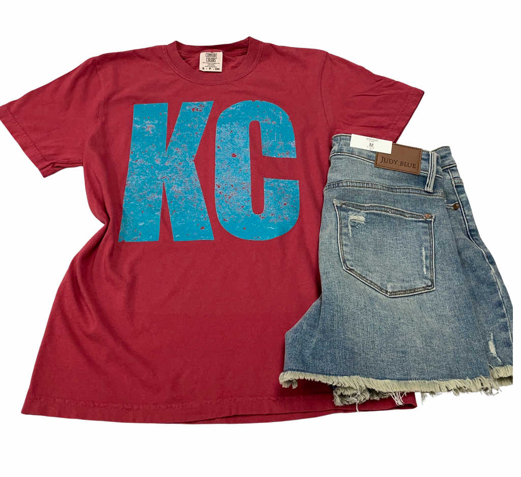 Blue KC on Red Graphic Tee-Graphic Tees-Tres Birdos Graphic Tees-Three Birdies Boutique, Women's Fashion Boutique Located in Kearney, MO