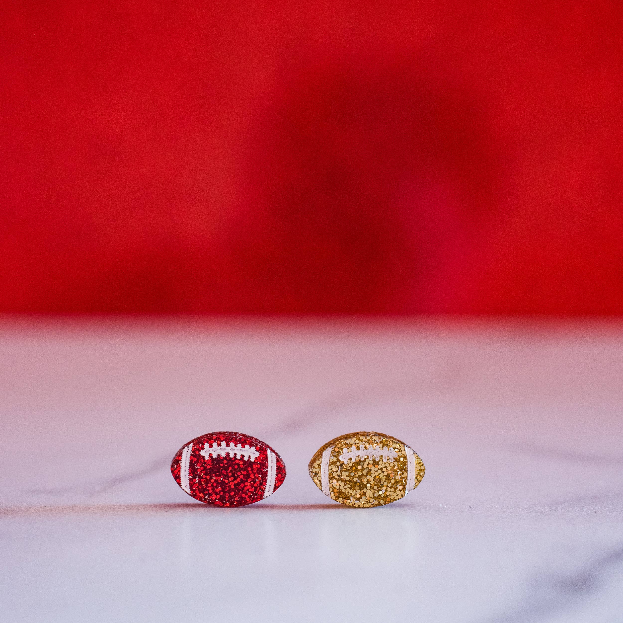 Kansas City Football Glitter Hand Painted Football Studs { product_type }}